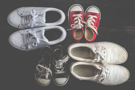 Family of sneakers, woodgrainの写真素材
