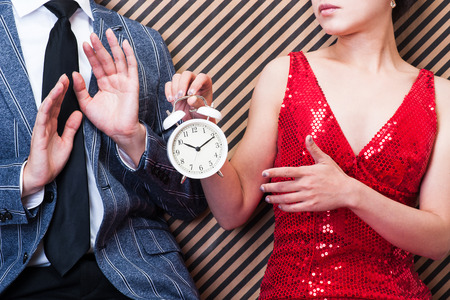 Clock,men and womenの写真素材