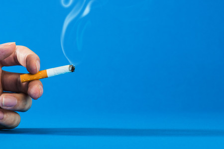 Tobacco, blue backgroundの写真素材