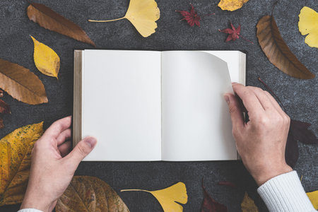 Reading and falling leaves