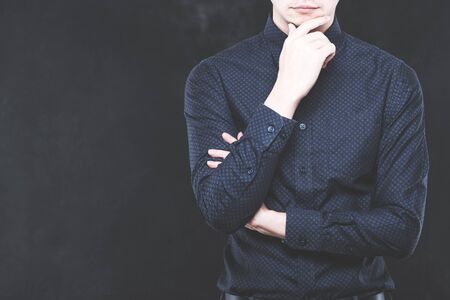 Men and dark backgroundの写真素材