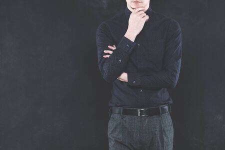 Men and dark backgroundの写真素材