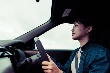 Woman you are driving a carの写真素材