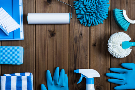 Cleaning tools placed on top of the wood tableの写真素材