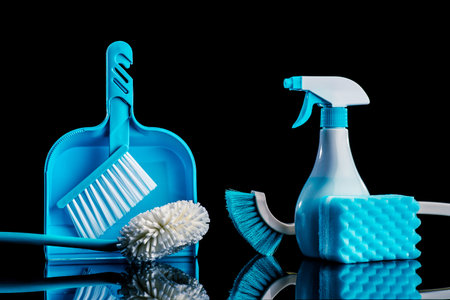 Cleaning tools black backgroundの写真素材