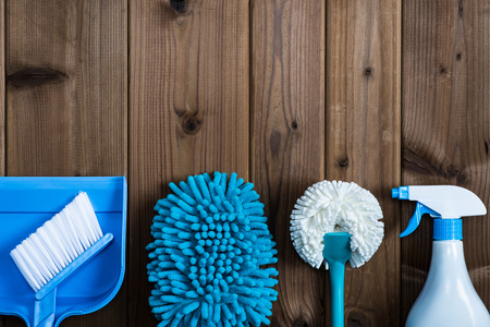 Cleaning tools placed on top of the wood tableの写真素材