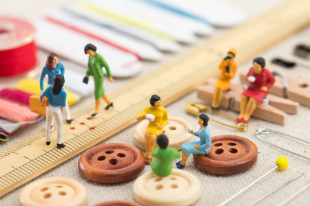 sewing tools and miniature womenの写真素材