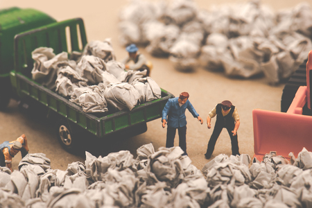 Garbage and miniature dollsの写真素材