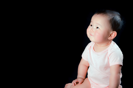 Cute baby, Black Backgroundの写真素材