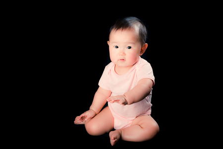 Cute baby, Black Backgroundの写真素材