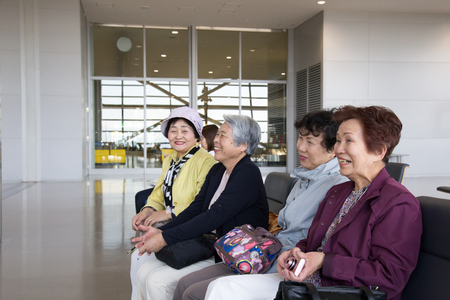 Elderly woman sittingの写真素材