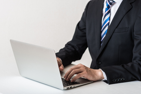 Laptop and businessman Body Partsの写真素材