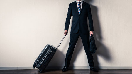 Suitcase and businessman, business tripの写真素材