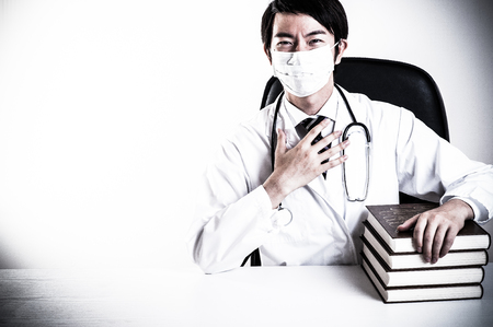asian doctor in roomの写真素材