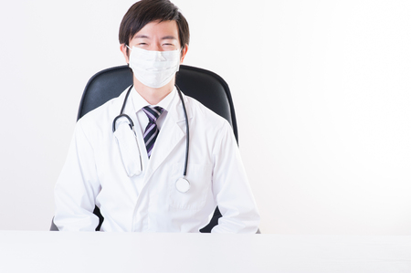 asian doctor in roomの写真素材