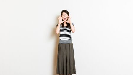 asian women shoutingの写真素材