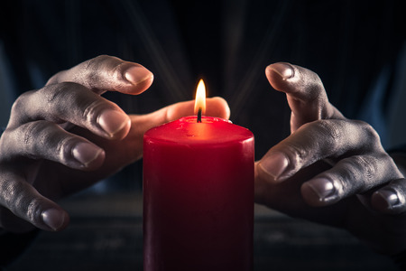 red candle and a manの写真素材