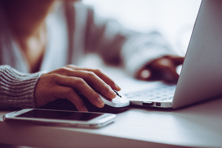 hands of women working on personal computersの写真素材