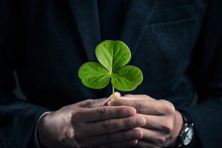 Businessmen with plantsの写真素材