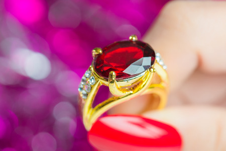 Women's hand with jewelry ringsの写真素材