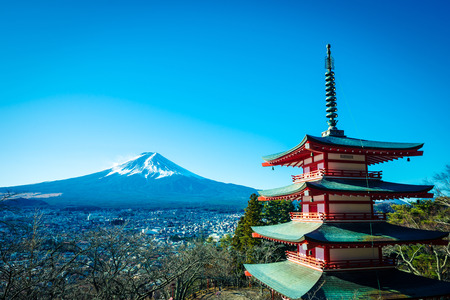 Yamanashi, Japan - December 28, 2017 : Mount Fuji and Chureito Pagoda. Chureito pagoda is located at Asakurayama in Fujiyoshida, Japan. Mount Fuji, Fuji san is famous mountain in Japan. Fuji is Japan's highest mountain.のeditorial素材