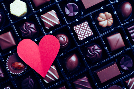 red heart and a lots of chocolateの写真素材