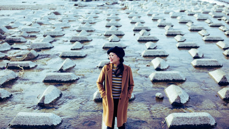 woman standing near a river