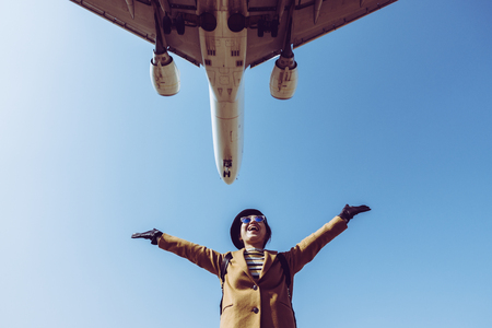 Asian woman and airplaneの写真素材