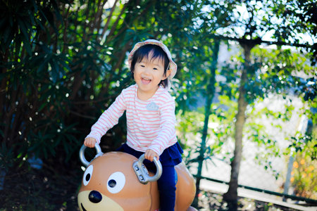 Cute children playing in the playgroundの写真素材