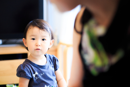 Cute child playing indoorsの写真素材