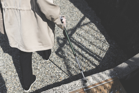 old woman and a caneの写真素材