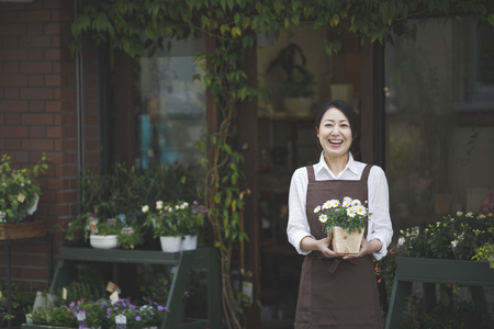 Japanese flower shop womanの写真素材