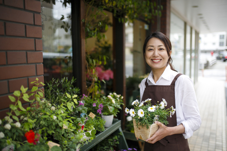Japanese flower shop womanの写真素材