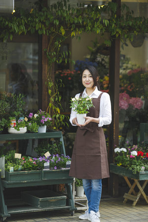 Japanese flower shop womanの写真素材