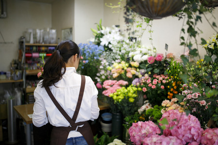 Japanese flower shop womanの写真素材