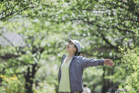 Asian women with green blurの写真素材