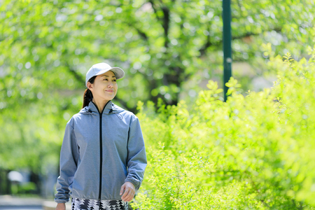 Asian women with green blurの写真素材