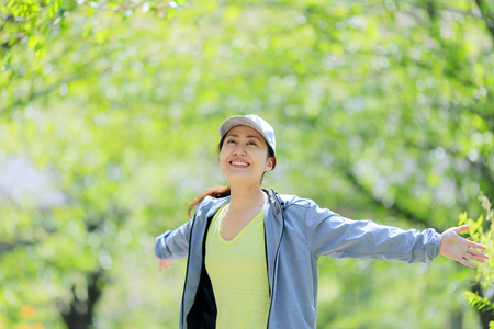 Asian women with green blurの写真素材