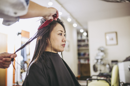 Asian women and hairdressersの写真素材