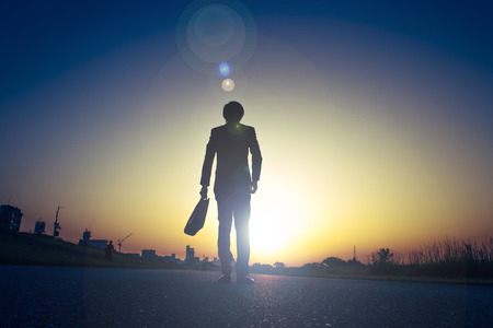 Businessman and morning lightの写真素材