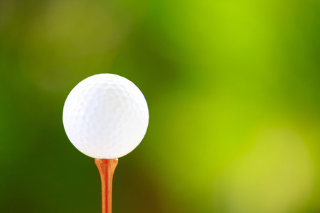 Golf ball green backgroundの写真素材