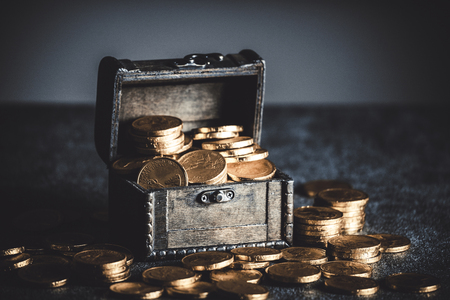 Gold coins in boxesの写真素材