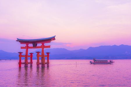 Hiroshima,Japan - July 25,2018 - Miyajima is a small island of Hiroshima in Japan. It is most famous for its giant torii gate, which at high tide seems to float on the water.のeditorial素材
