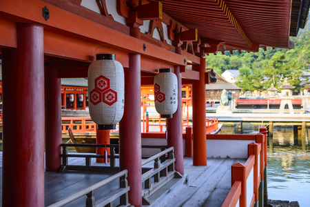 Hiroshima,Japan - July 26,2018 - Miyajima is a small island of Hiroshima in Japan. It is most famous for its giant torii gate, which at high tide seems to float on the water.のeditorial素材