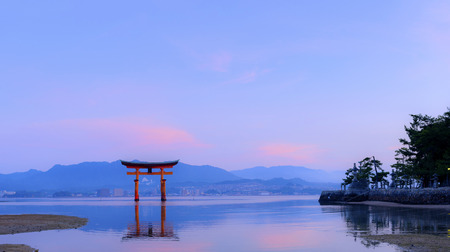 Hiroshima,Japan - July 26,2018 - Miyajima is a small island of Hiroshima in Japan. It is most famous for its giant torii gate, which at high tide seems to float on the water.のeditorial素材