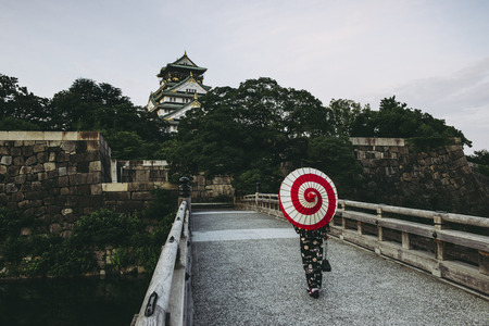 Japanese kimono and Osaka Castleのeditorial素材