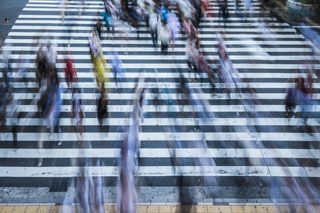 People crossing the crosswalk in Osaka, Japanのeditorial素材
