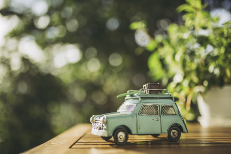 Green blur background and toy carの写真素材