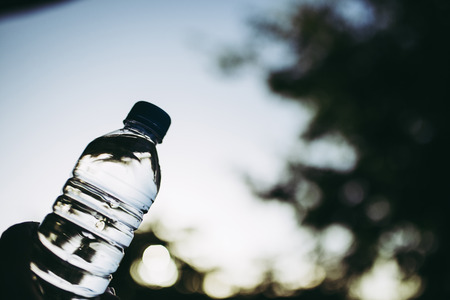 Green blur background and mineral waterの写真素材