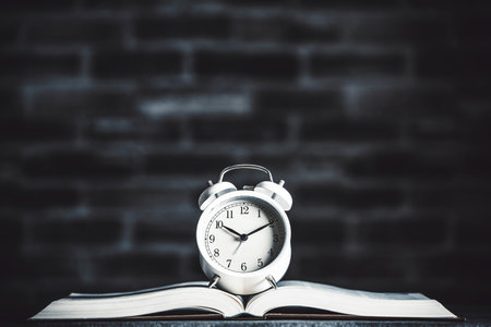 Alarm clock and books